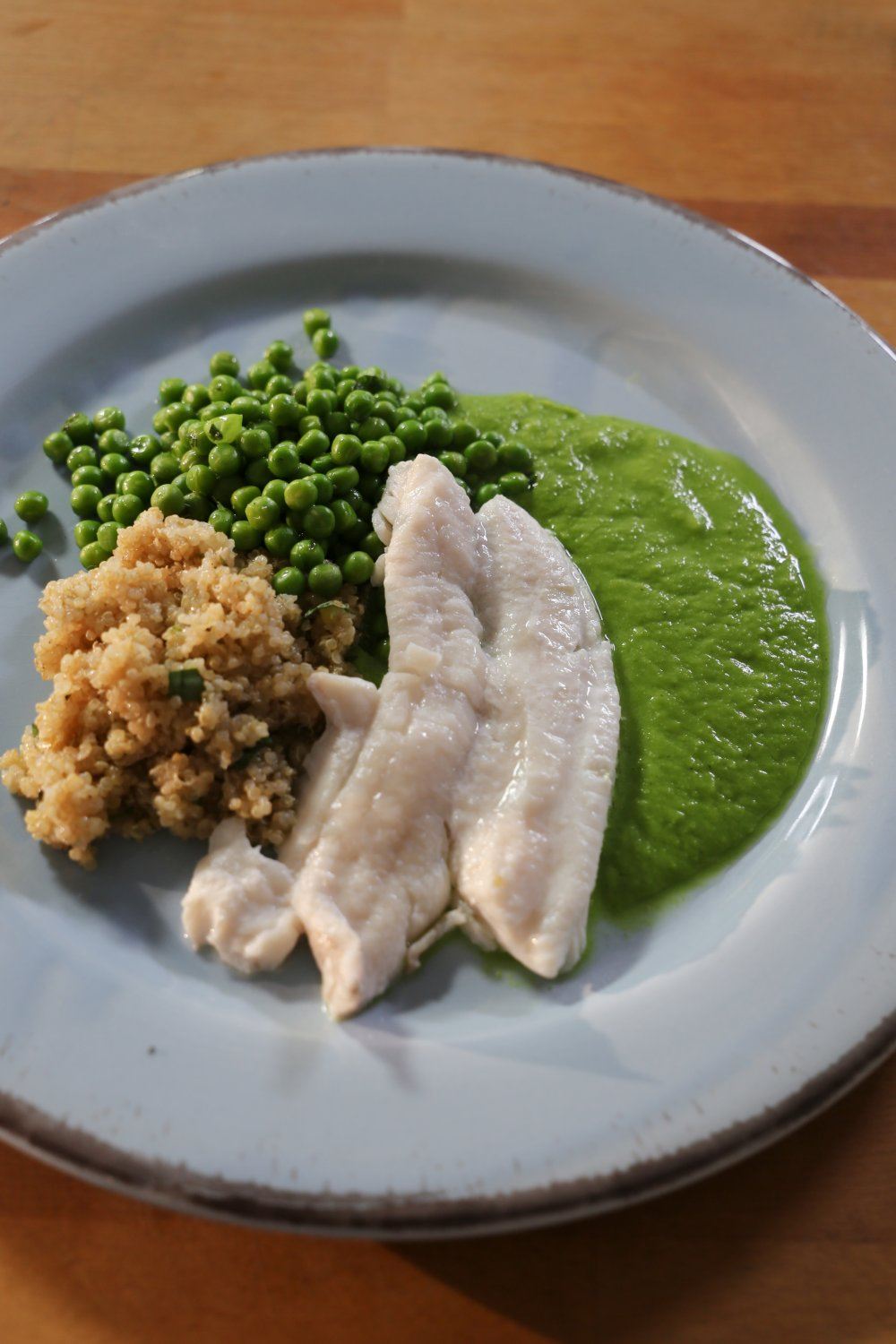 Quinoa met steenbolk en erwtjes 