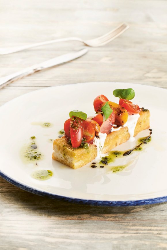 Bruschetta met stracciatellaschuim en kerstomaatjes